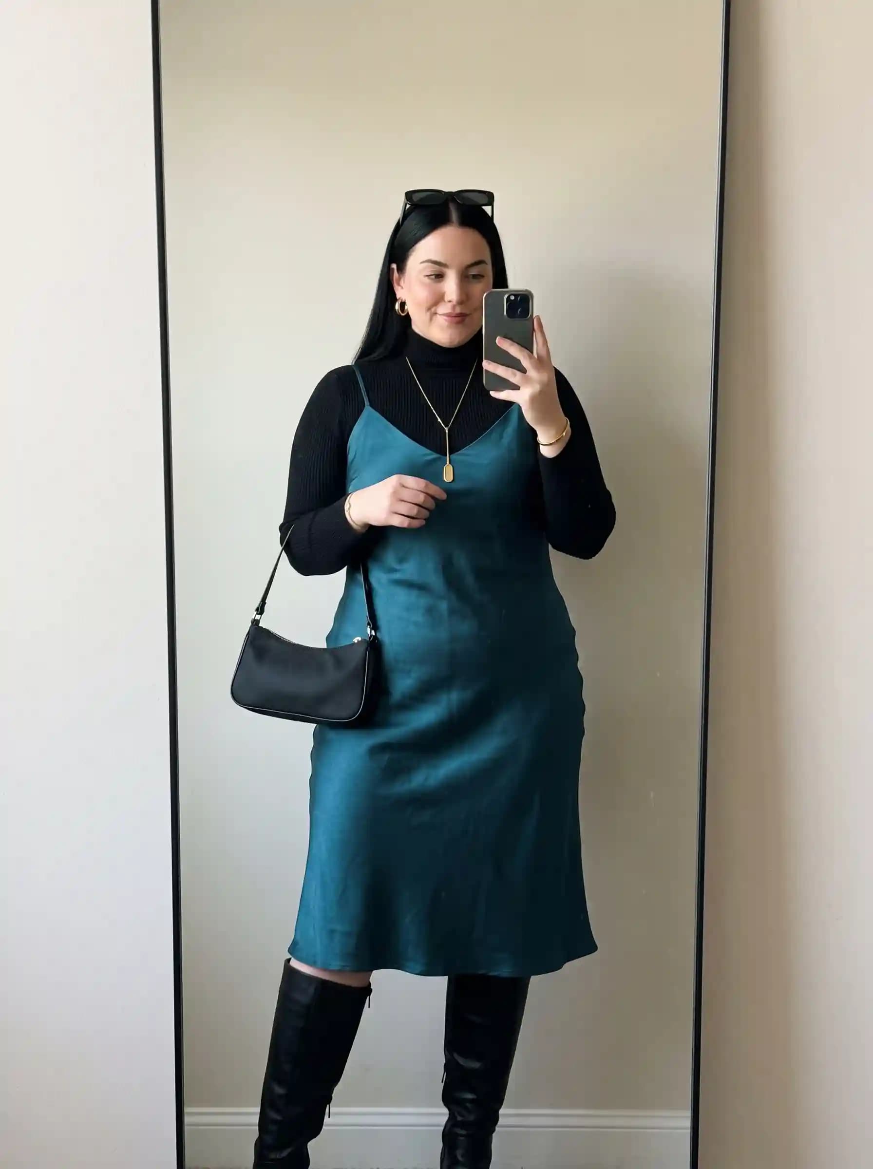 Black Turtleneck + Teal Satin Slip Dress + Black Knee-High Boots